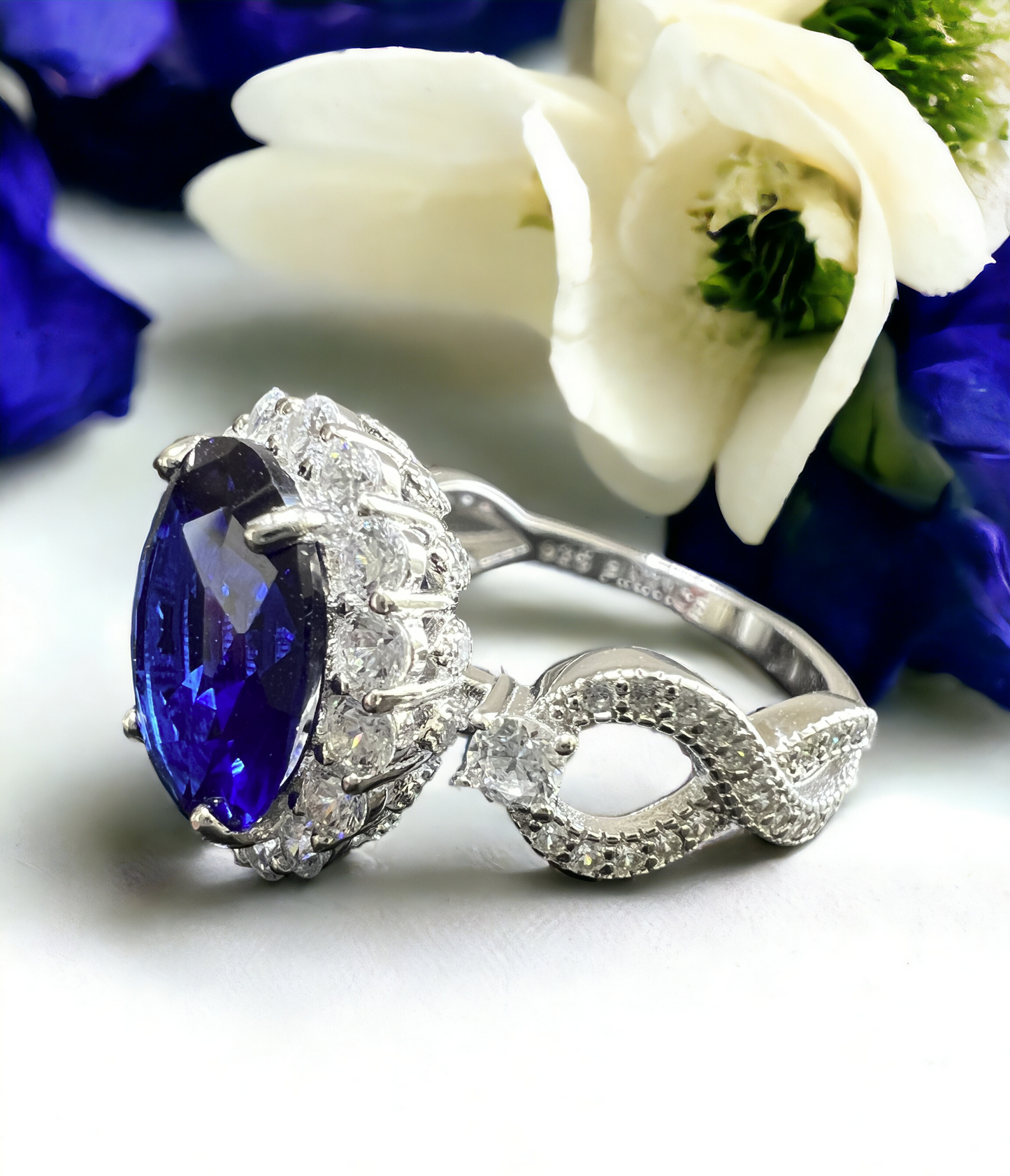 925 Sterling SIlver Infinity Oval Cut Sapphire Blue CZ Ring